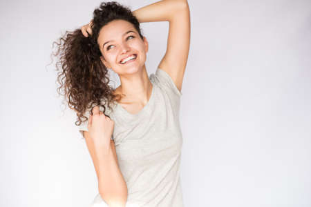 smile happy woman young curlsの写真素材