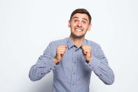 Emotional business man on white background