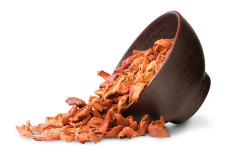 Dried Apples In The Inverted Ceramic Bowl Isolated On White Backgroundの写真素材