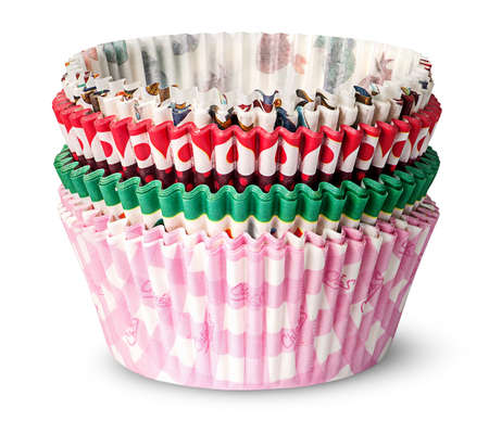 Stack of multicolored paper cups for baking muffins isolated on white backgroundの写真素材