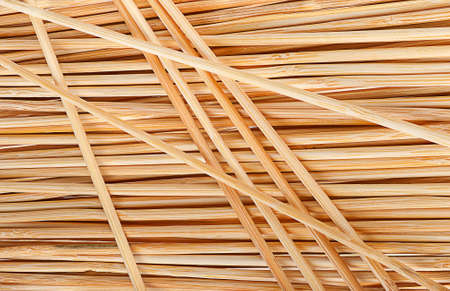 Closeup abstract background of crossed bamboo sticksの写真素材