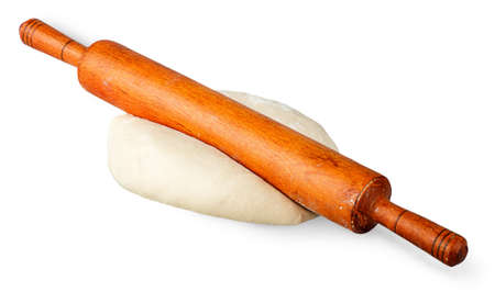 Rolling pin on a piece of dough isolated on white backgroundの写真素材