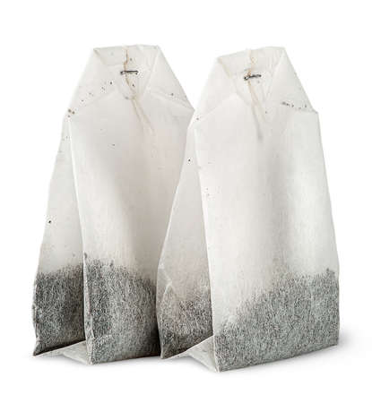 Two tea bags each other isolated on white backgroundの写真素材