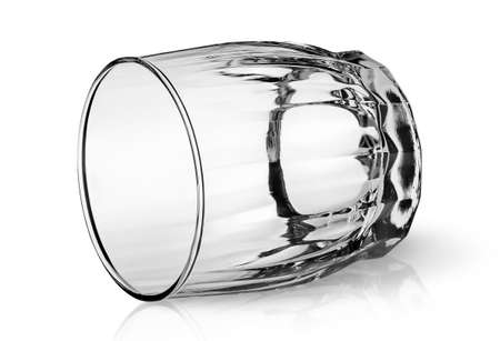 Empty glass for whiskey lyingの写真素材