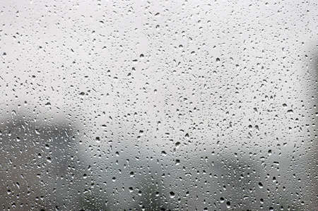Water drops on window glassの写真素材
