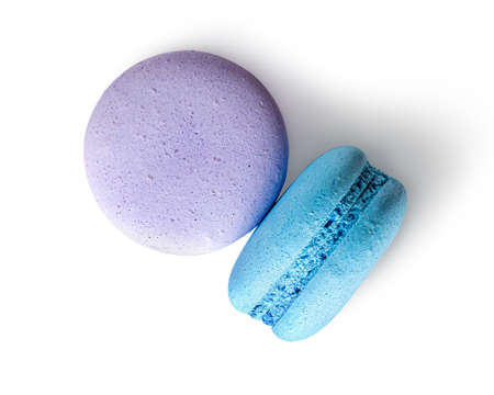 Two macaroon purple blue top view on white backgroundの写真素材
