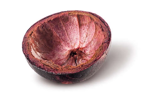 Dark purple mangosteen shell isolated on whiteの写真素材