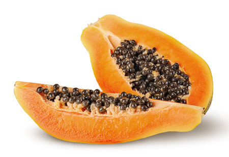 Half and quarter ripe papaya isolated on white backgroundの写真素材