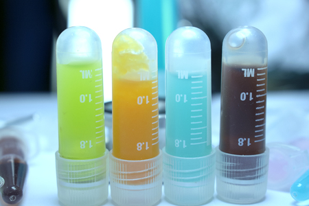Research Vial Cancer Immunotherapy Colorful Displayの写真素材