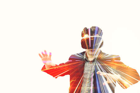 Double Exposure of Young businessman wearing VR glasses lights of virtual realityの写真素材