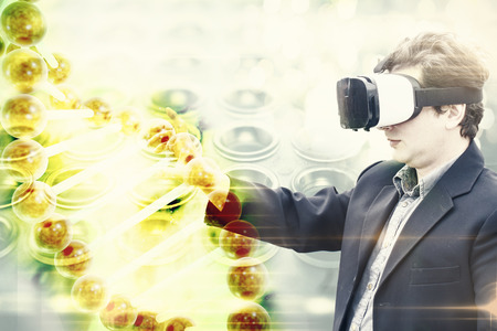 double exposure of doctor researcher medic with VR glasses analyzing DNA helix simulating cure research techniqueの写真素材