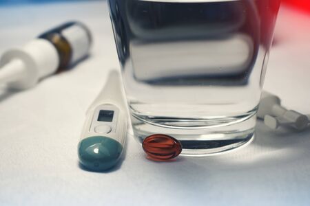 Influenza virus treatment with pills cough syrup effervescent pills nose drops vialsの写真素材