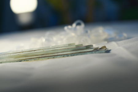 Vintage microscope slide with notes on it, laboratory glassware, research microscope slideの写真素材