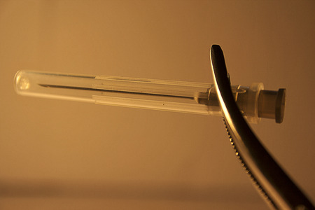 Forceps Holding Syringe Needleの写真素材