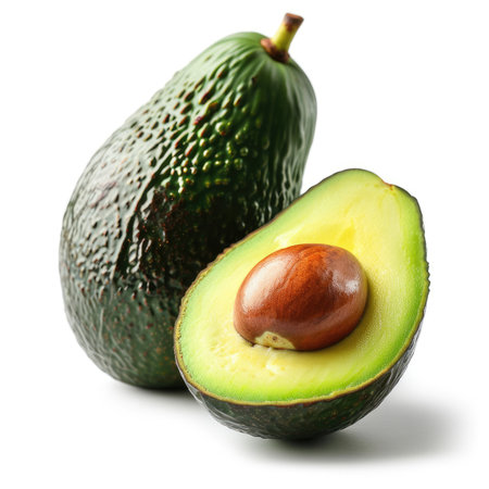 Ripe avocados with seeds on white background, closeupの素材