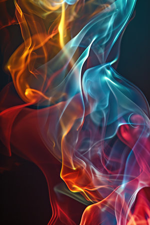 abstract multicolored smoke on a dark background close-upの素材