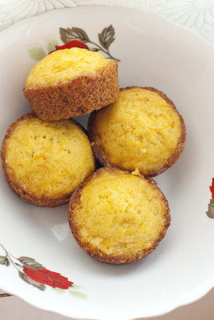 Traditional homemade brioche with carrot on white plateの写真素材