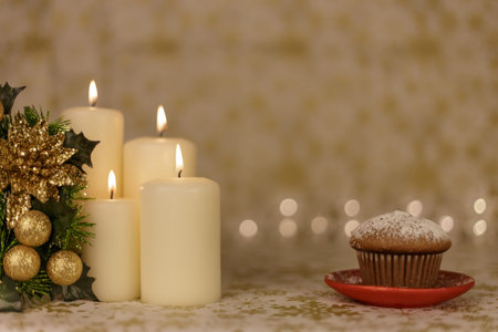 Greeting Christmas card with burning candles and ornaments