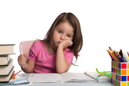 Young girl learning how to write.の写真素材