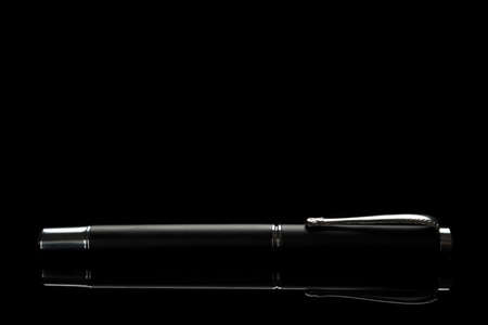 black office pen silhouette and reflectionの写真素材