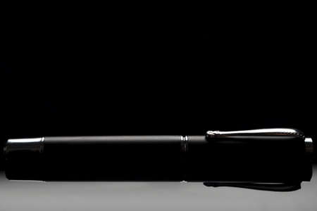 black office pen silhouette and reflectionの写真素材