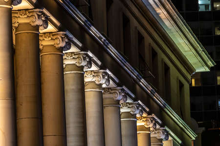 Close up of the pillars on the Ministry of Defense building in Sofia at nightの写真素材