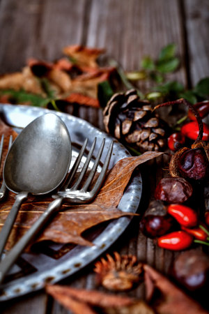 Thanksgiving Place Setting with fallen leaves