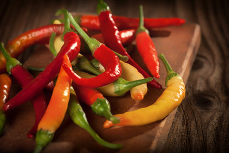 Chili Peppers on dark background