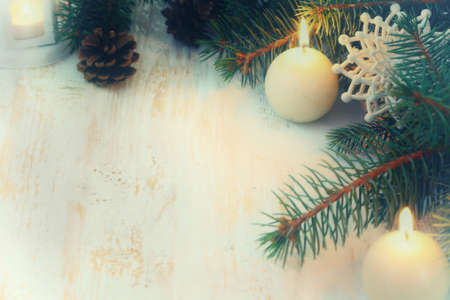 Christmas composition with snow, candle and Pine cones - copy spaceの写真素材