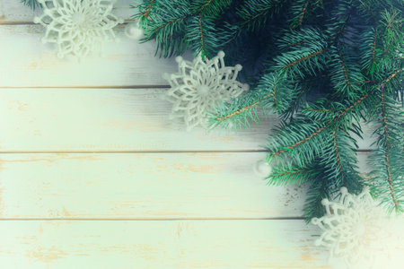 Christmas ornaments with pine tree on white wooden tableの写真素材