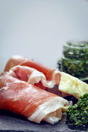 Italian  prosciutto with pesto - close upの写真素材