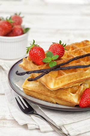 Waffles with Fresh Strawberries and Vanilla beansの写真素材