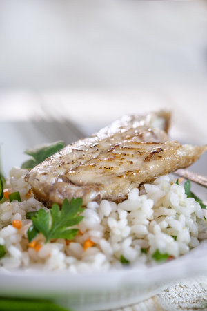Healthy fish fillet on rice
