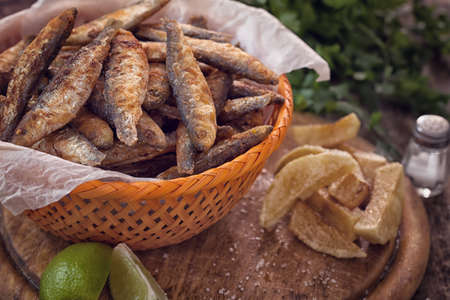Fish and chips on wooden table with copy spaceの写真素材