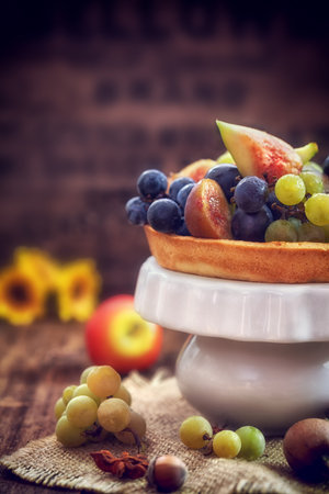 Autumn concept - Autumn fresh fruit on wooden background with copy spaceの写真素材