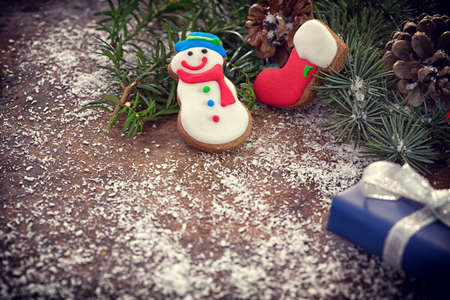 Christmas gift box and gingerbread cookies with copy spaceの写真素材