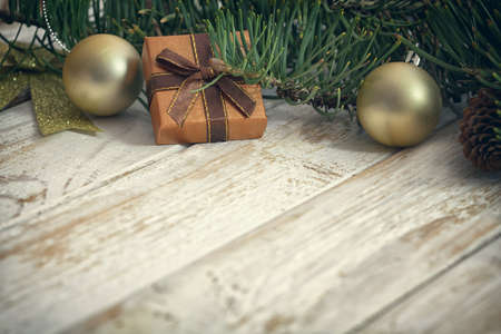 Christmas garland on rustic white wooden table with copy spaceの写真素材