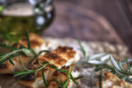 Italian antipasto - Appetizers with olive oil and herbs