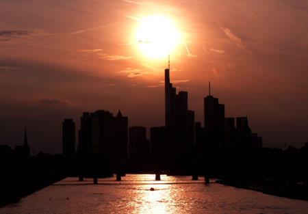 Golden sunset over Frankfurt - Silhouette of the skyline, Hessen, Germanyの写真素材