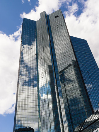 FRANKFURT, GERMANY - June 27, 2014  Clouds reflecting on twin towers  Both towers rise to 155 m and serve as headquarters for Deutsche Bank, the largest bank in Germany のeditorial素材