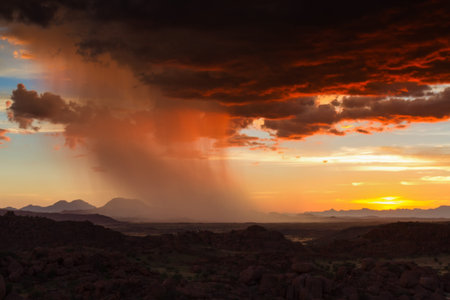 Thunderstorm at sunset over Damaraland, Namibia, Africaの写真素材