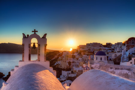 Village of Oia at sunset, Santorini, Greeceの写真素材