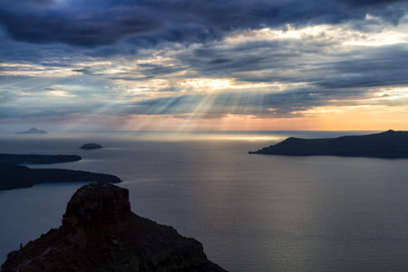 Sunrays over the mediterranean sea, Santorini, Greeceの写真素材