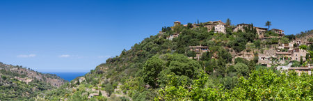 Panorama of the hilltop village of Deia Mallorca Baleares Spainの写真素材