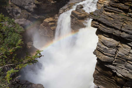 Rainbow at Athabasca Falls, Icefields Parkway, Alberta, Canadaの写真素材