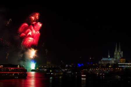 Colorful firework over the river Rhine, Cologne, Germanyの写真素材