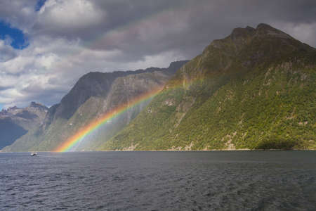 Rainbow at the Hjorundfjord, Fjordland, Norwayの写真素材