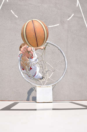 Basketball player shootingの写真素材