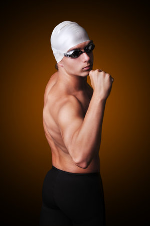 Male swimmer with clenched fistの写真素材