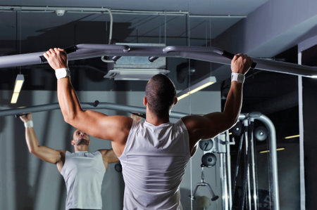 Handsome Muscular Male Model With Perfect Body Doing Pull Ups